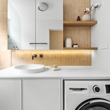 Small Bathroom and Laundry Space South Yarra Terracotta Tile Vertical Stack Tile Pattern Shaving Cabinet Brushed Gunmetal Fixtures and Fittings