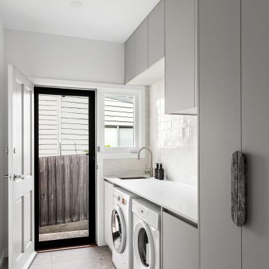Custom Laundry Renovation Floor to Ceiling Linen Cupboard Zellige Tiles Natural Stone Handle