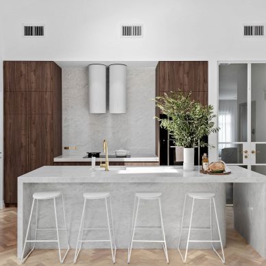 Kitchen Renovation Herringbone Flooring Interior Design Northern Melbourne Suburbs Curved Stone Island Bench High Ceilings Natural Light Cylinder Rangehood