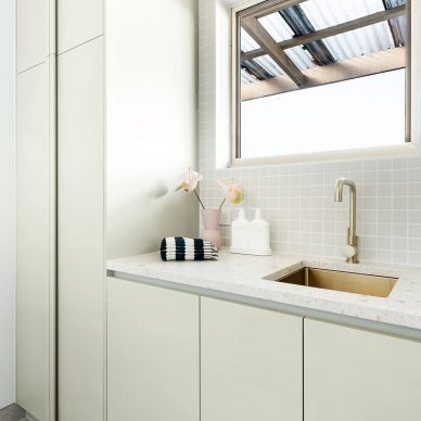 Green Laundry Custom Interior Design Moorabin Brushed Brass Tapware Custom Floor to Ceiling Cabinetry
