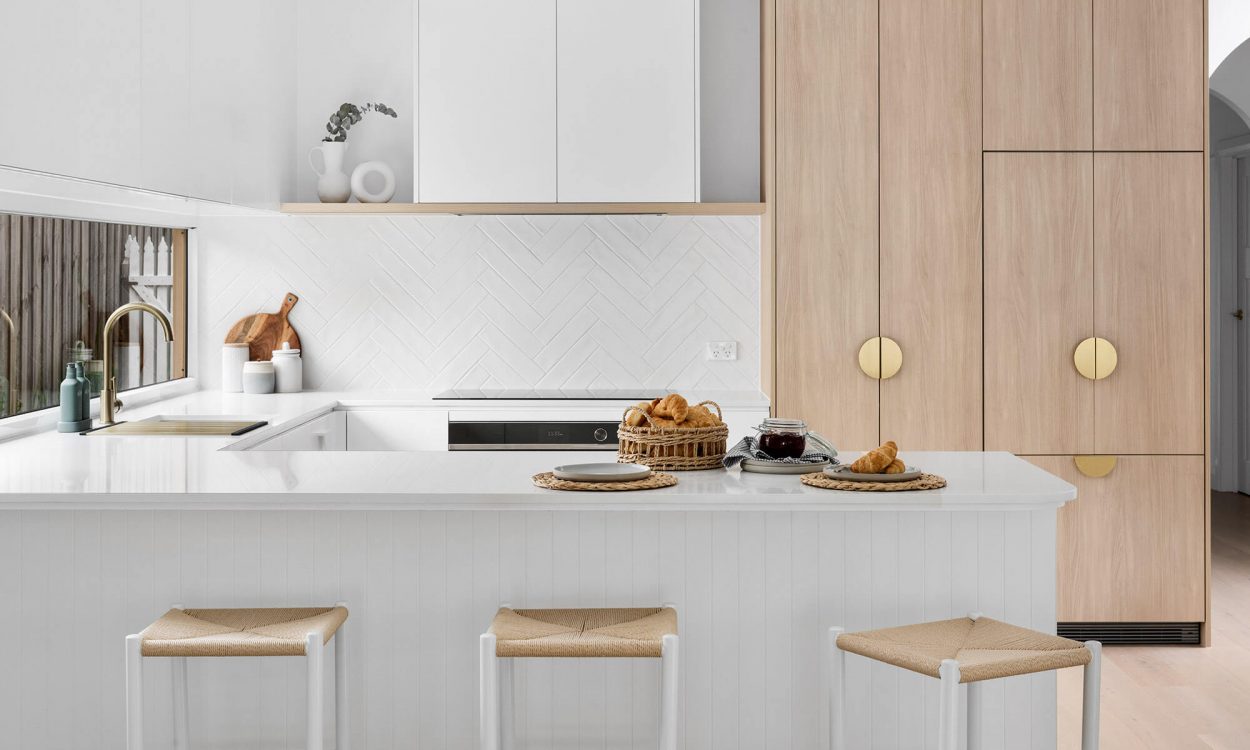 Montmorency Home Renovation Melbourne Interior Design White Timber Brushed Brass Kitchen Herringbone White Subway Splashback Tile Engineered Floorboards