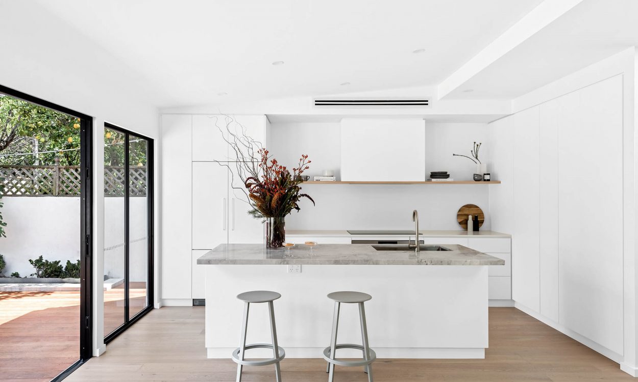 Modern Home Renovation Richmond Marble Benchtop White Kitchen Island Bench Engineered Flooring Intergrated Appliances Melbourne Interior Design Renovation Company