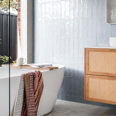 Greensborough Ensuite Renovation Custom Interior Design Free Standing Bathtub Vertical Stacked Blue Subway Tiles Boho Inspired Design Rattan Vanity