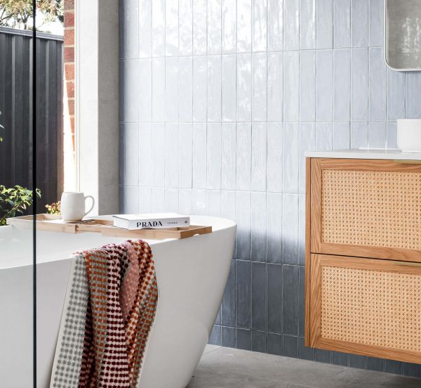 Greensborough Ensuite Renovation Custom Interior Design Free Standing Bathtub Vertical Stacked Blue Subway Tiles Boho Inspired Design Rattan Vanity